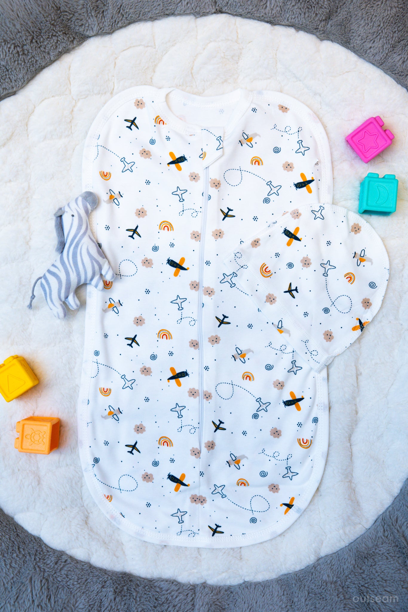 Outseam Newborn Sleep Cocoon - Airplane — soft cotton baby sleep cocoon with outward seams